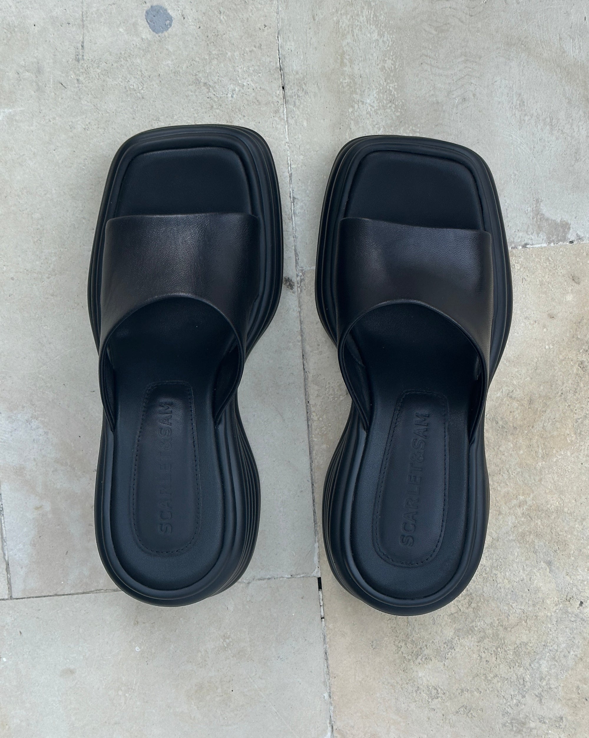 Scarlet & Sam's famous JUICY WEDGES. These shoes are a combination of Rubber & Leather to provide maximum comfort & style. The Juicy Wedge is the perfect summer staple: Black, Chunky, Platform, Square Toe, Soft footbed, flattering sandal. 