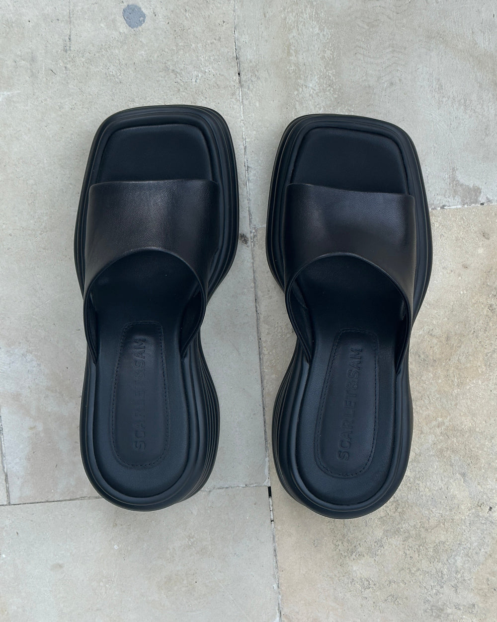 Scarlet & Sam's famous JUICY WEDGES. These shoes are a combination of Rubber & Leather to provide maximum comfort & style. The Juicy Wedge is the perfect summer staple: Black, Chunky, Platform, Square Toe, Soft footbed, flattering sandal.