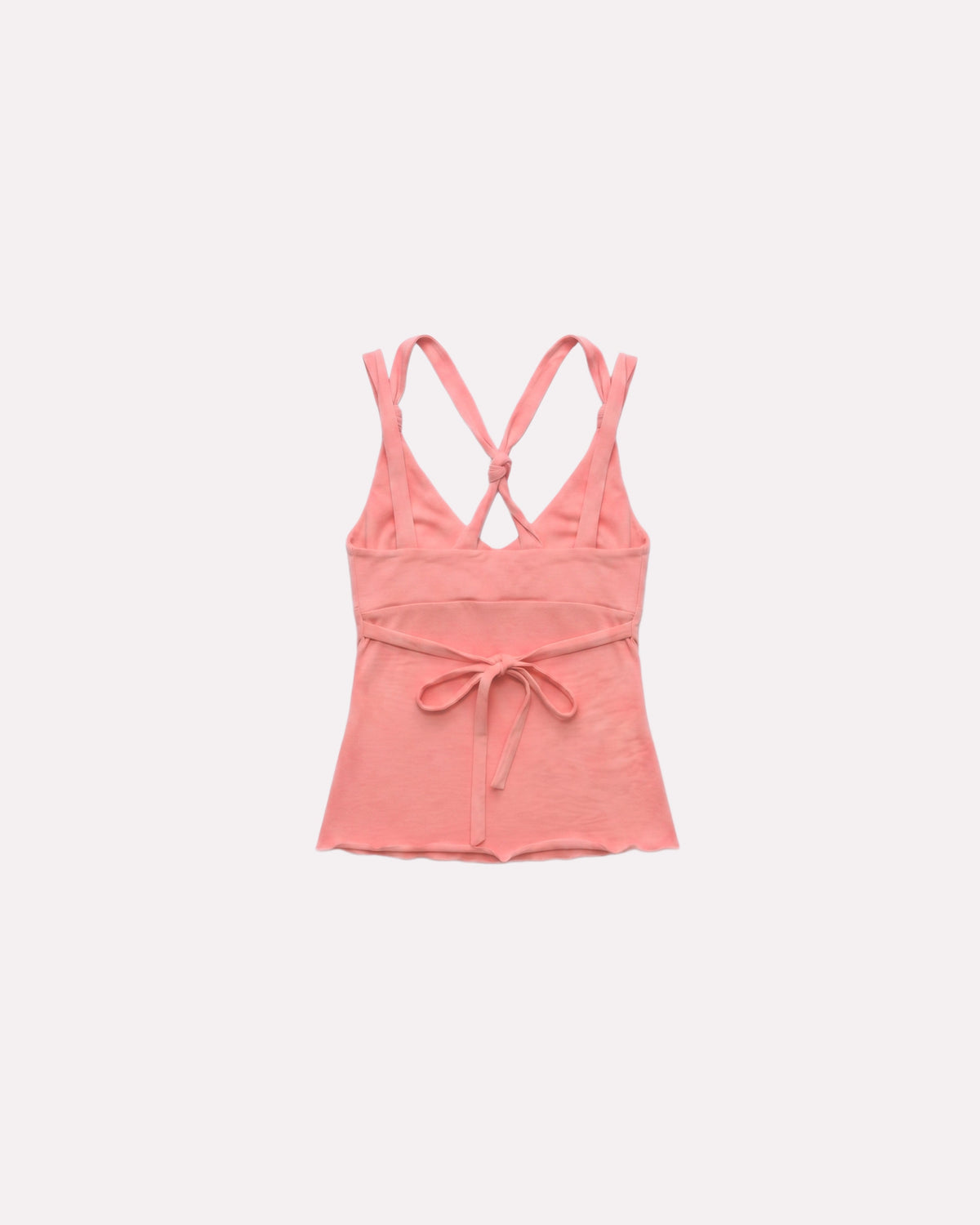 Peach Bailee Knot Tank, back view, laid flat to show the crossed straps and tie.
