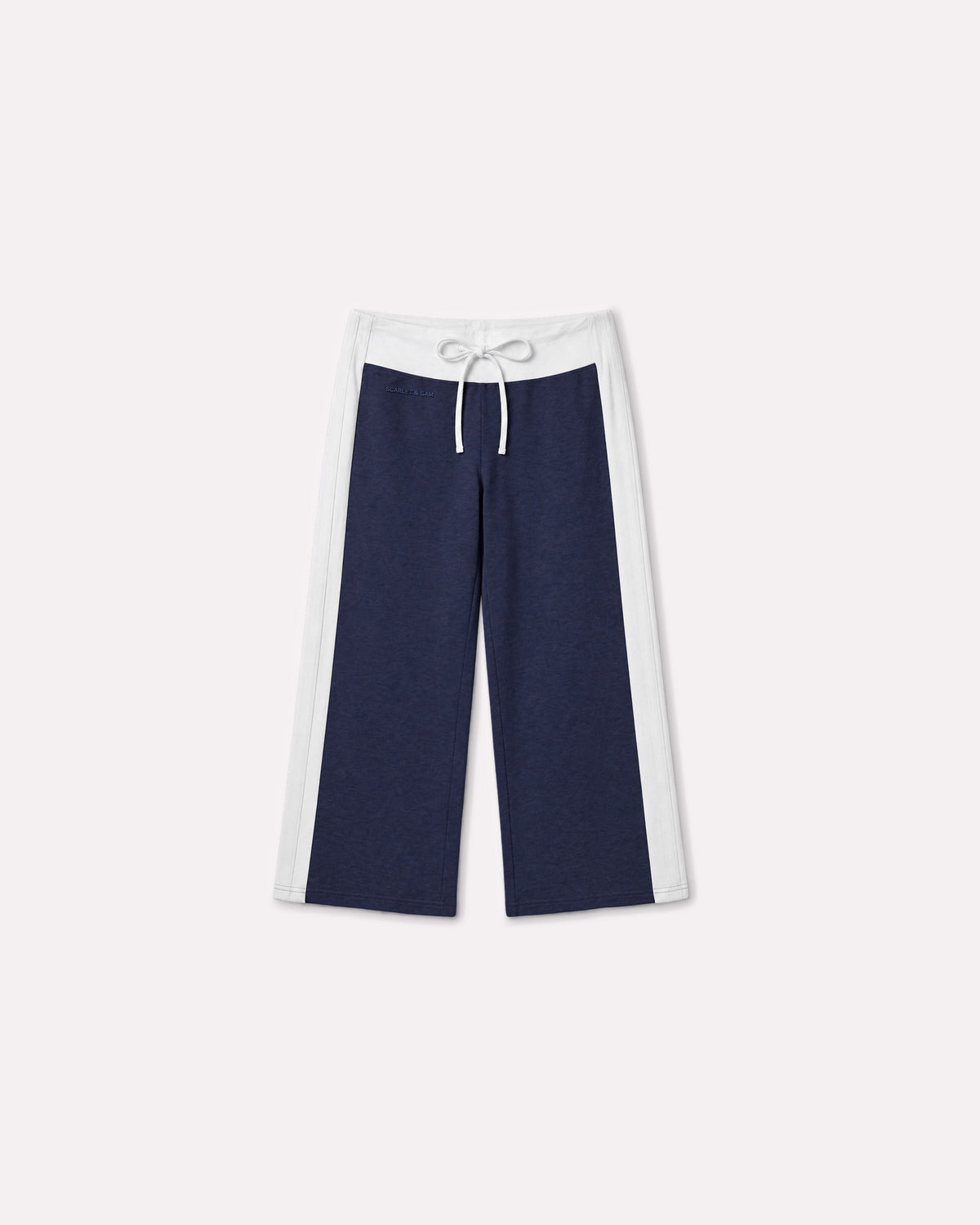 Navy Jersey Capri pants, front flat lay, showing the wide cropped legs, white waistband, drawstring and contrast side panels.