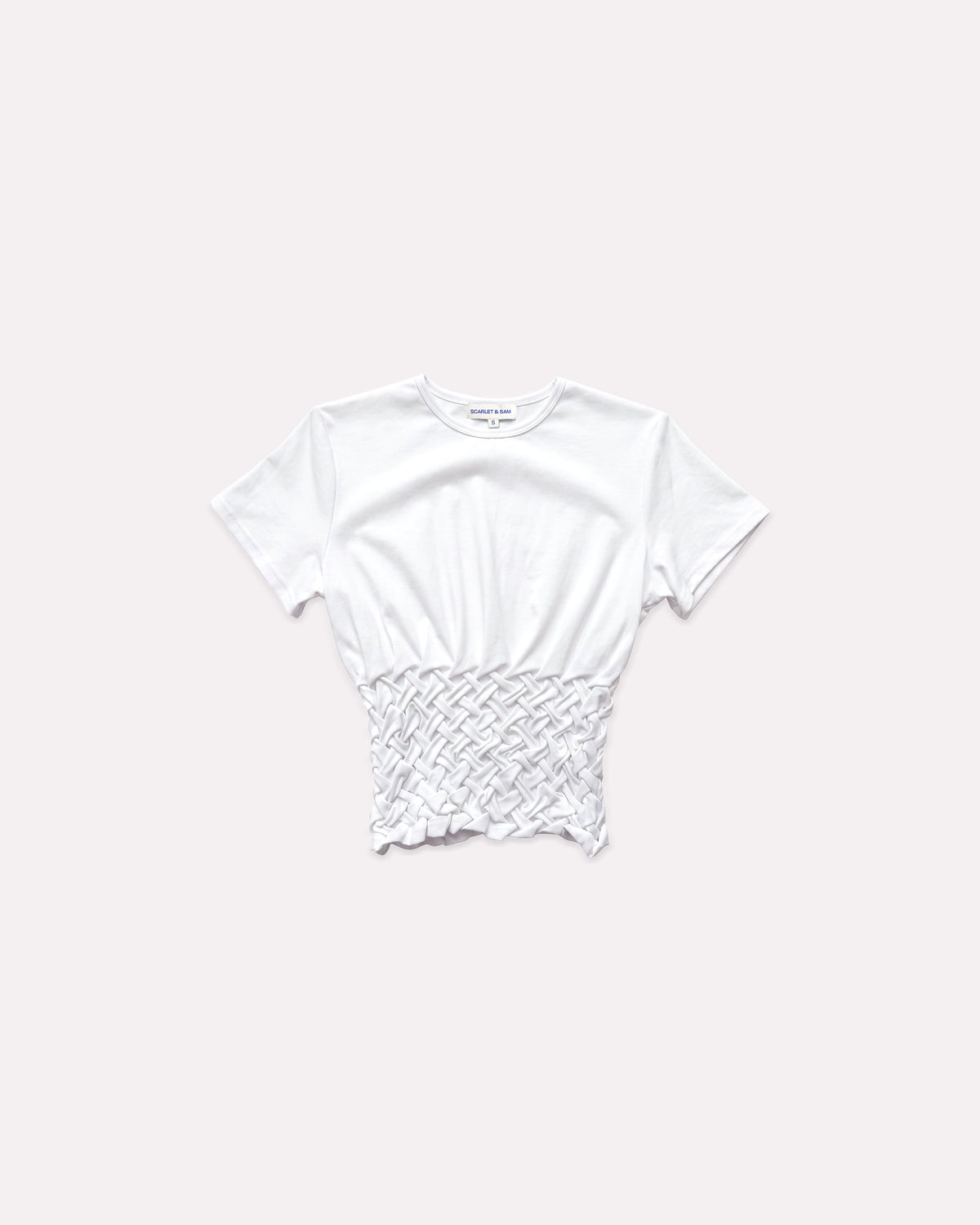 White Braided Tilly Tee, front view, laid flat.