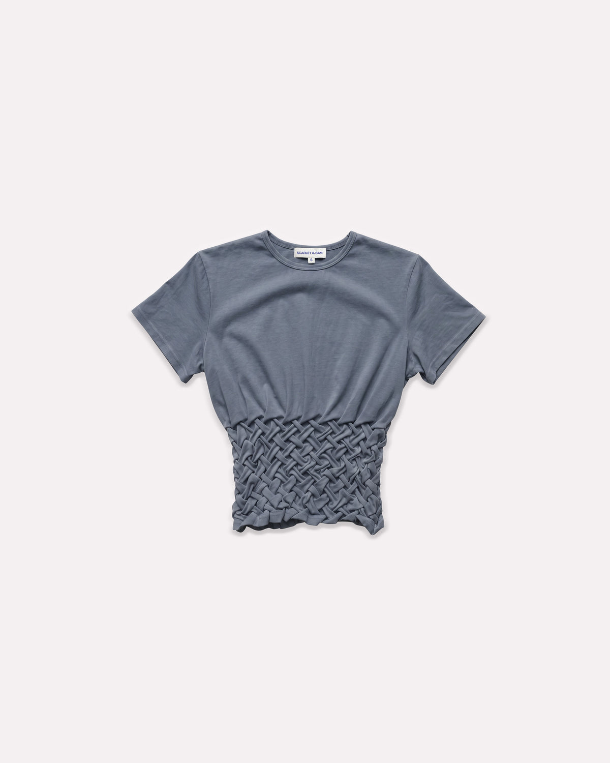 Blue Denim Braided Tilly Tee, front view, laid flat to show the braided waist.